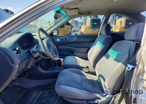 2000 Honda Civic Dx z USA, uszkodzony, nr VIN 1HGEJ6223YL102652